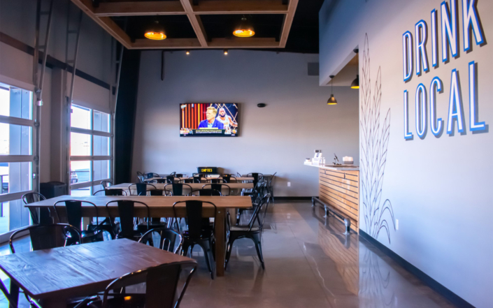 4 By 4 Brewing Company Drink Local Mural with Seating and TV