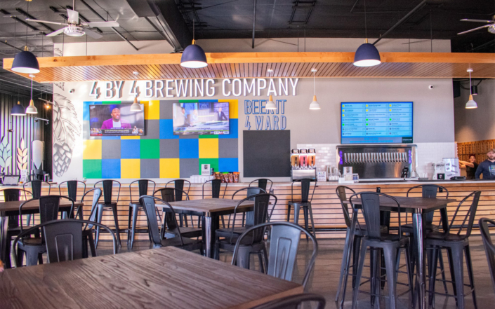 4 By 4 Brewing Company Bar with TVs on Wall