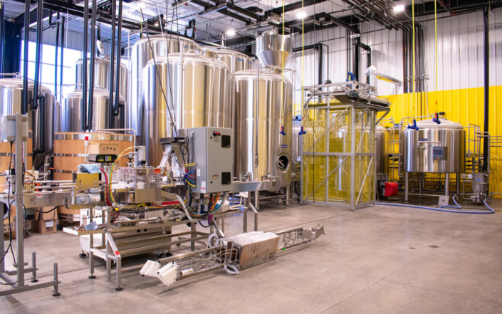 4 By 4 Brewing Company Brewing Tanks in Warehouse Area