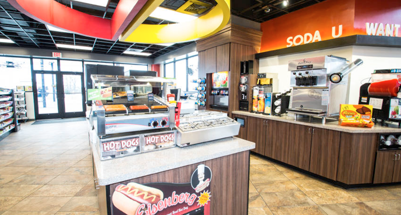 Using-Architecture-to-Enhance-Your-Brand-content-6 View of Hot Dog rollers and soda machines in SIGNAL convenience store